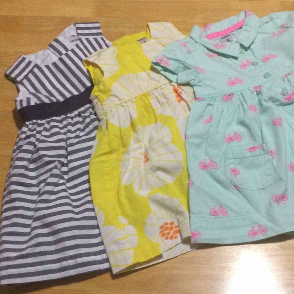 3 Carters dresses with matching diaper covers all worn only once